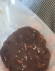 A dark chocolate cookie studded with chunks and flaked sea salt